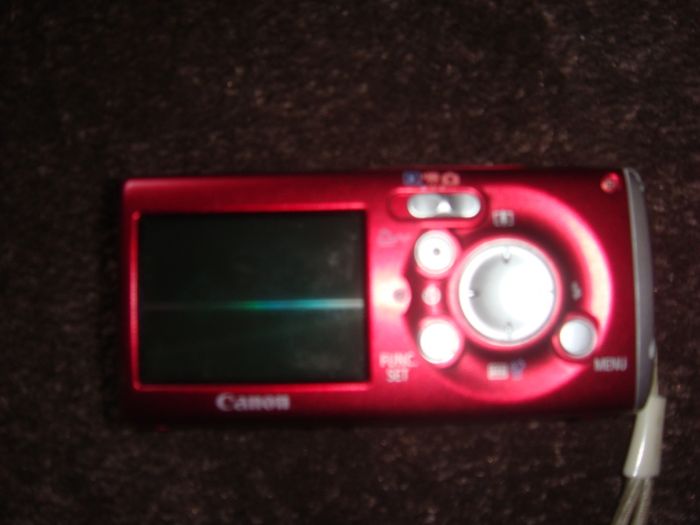 Canon Ixus Zoom- as small as a phone to fit in pocket