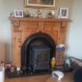 Timber surround with cast iron insert for fireplace Image 3