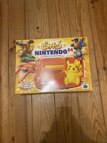 Nintendo 64 orange Pokemon pikachu console