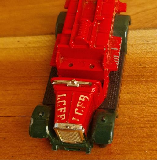 4 vintage toy cars -