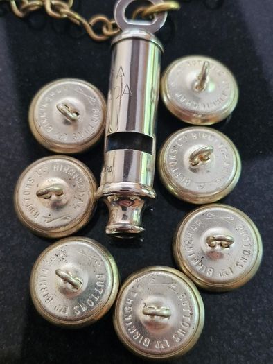 An Early Garda Siochana Whistle And Set Of 7 Buttons