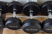 2xbrand new sets of dumbbells 2x12.5kilo, 2x10kilo .