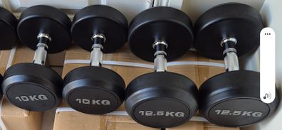2xbrand new sets of dumbbells 2x12.5kilo, 2x10kilo .