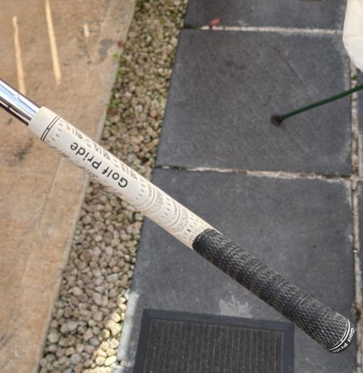 Titleist T100s irons.