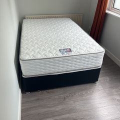 Queen sized Mattress and bed