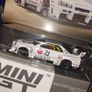Mini GT 1:64 scale diecast model of the Nissan LB-ER34 Super Silhouette Athlet/Collet car. Liberty Walk's Nissan Skyline GT-R Blister Pack Image 3