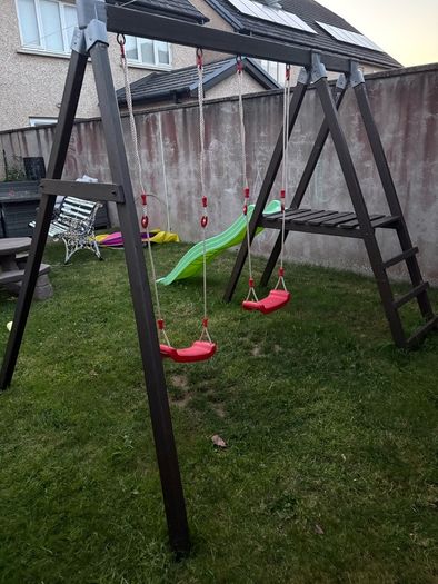 Double swing set with slide.