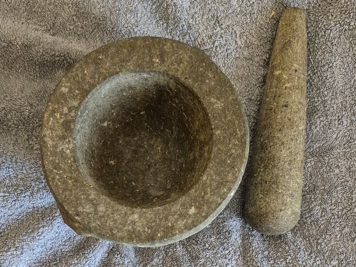 Vintage granite pestle and mortar. Very heavy.