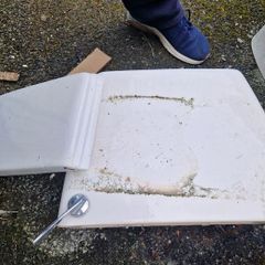 Used ceramic toilet cistern tank
