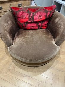 2 brown swivel chairs