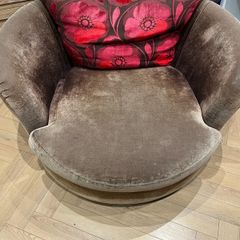 2 brown swivel chairs