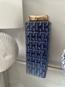Blue and gold square lidded jar.
