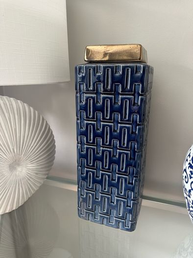 Blue and gold square lidded jar.