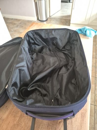 small navy suitcase