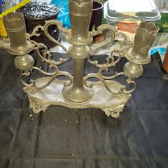 Antique Late 19th early 20th century three light candelabra, with scalloped candle nozzles, scrolling foliate branches and an oval base with chased decoration