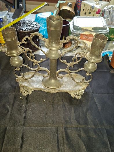 Antique Late 19th early 20th century three light candelabra, with scalloped candle nozzles, scrolling foliate branches and an oval base with chased decoration