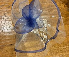 Blue and white fascinator with pearls
