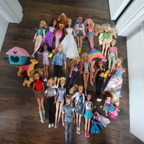 Barbie dolls with babies and dogs