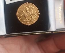 half sovereign ring
