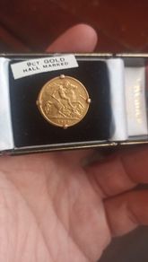 half sovereign ring