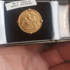 half sovereign ring