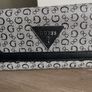Guess purse. Never used but slightly worn due to storage. Image 2