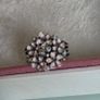 Pandora cherry blossom bouquet ring, size 58 some signs of wear on the back, as shown in the photos. Otherwise, no issues. Image 3