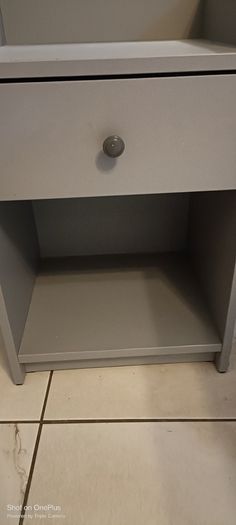 Grey bedside locker from Ikea