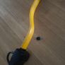 a steering wheel lock with a key Image 2