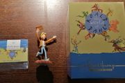 Charlie Bucket Holding Golden Ticket Figurine