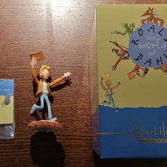 Charlie Bucket Holding Golden Ticket Figurine