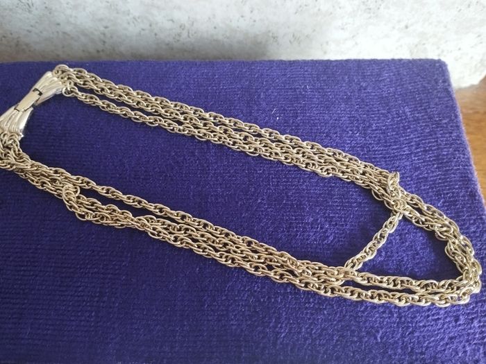 Vintage gold tone multi chain necklace with beautiful clasp.