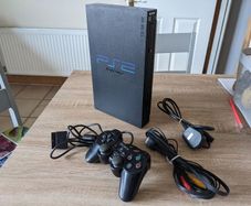 PS2 console with controller and cables