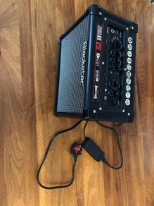 Electric guitar with amplifier