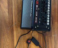 Electric guitar with amplifier