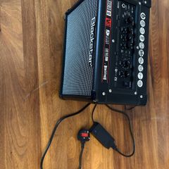 Electric guitar with amplifier