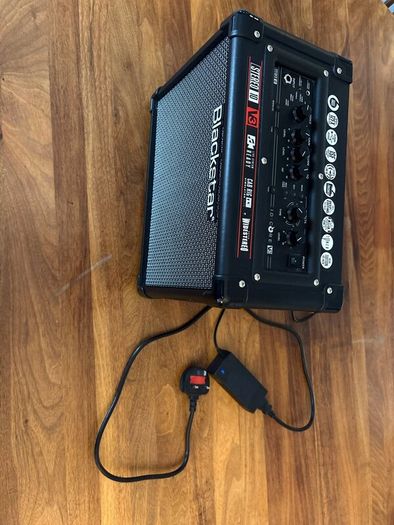 Electric guitar with amplifier