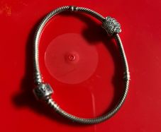 Pandora Moments Barrel Clasp Snake Chain Bracelet with silver Sparkling Paw Print Charm