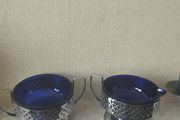 Vintage cobalt blue glass milk jug and sugar bowl with chrome baskets.