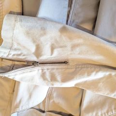 Ladies jacket. Zip fastening and zips on sleeves.