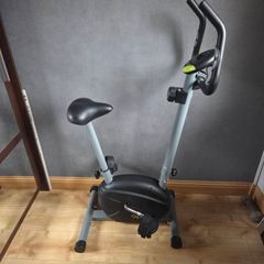 OPTI space saver exercise bike