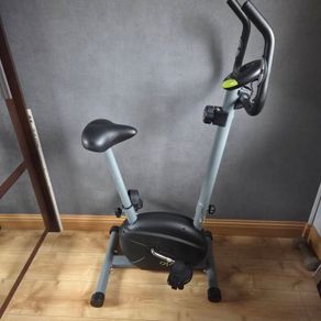 OPTI space saver exercise bike