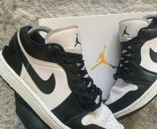 Nike Air Jordan 1 Low in a "Panda" or white/black colorway Size 7