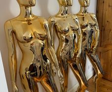 2 gold mannequins