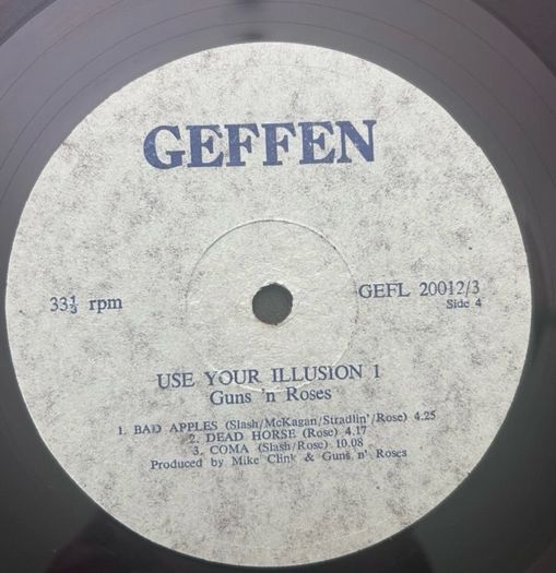 Guns n Roses very rare Zimbabwe Pressing. Use your illusion 1  Vinyl, vg+ .The sleeve is VG+.  Small splits to mid front opening. Small tear to back