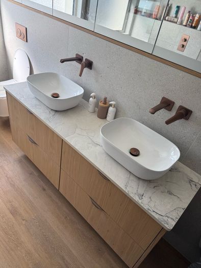 Stone countertops backsplashs window cills.