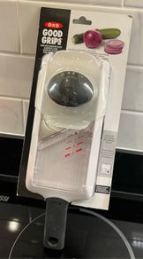 Good Grips - hand-held mandoline slicer