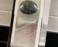 Good Grips - hand-held mandoline slicer