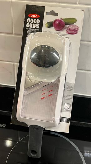 Good Grips - hand-held mandoline slicer