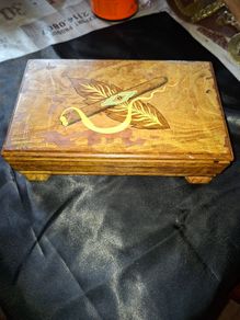 Vintage Wooden Musical Cigar and Cigarette Box, Cigar and Tobacco Leaves on the Lid., when Opened it Plays Music., a beautiful collectors lot,